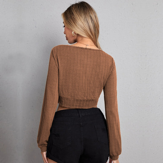 Damen gestricktes Cropped-Wickeltop mit V-Ausschnitt, taillierter Unterbrustnaht und Zopfmuster-Optik Eichborn Berlin