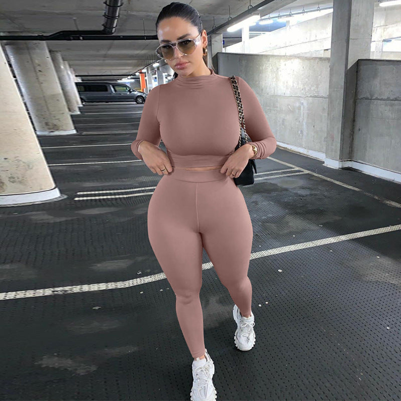 Damen Sportliches Set mit hochgeschlossenem Oberteil und enganliegenden Leggings EB