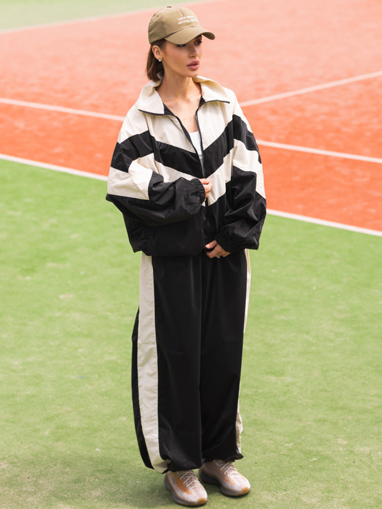 Damen Leichte Windjacke im Colorblock-Design mit Reißverschluss und elastischen Bündchen EB