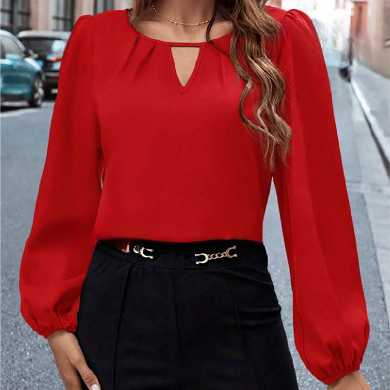 Damen elegante Bluse mit modischem Schlüsselausschnitt und raffinierten Puffärmeln EB