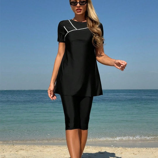 Damen Sportanzug mit kurzem Oberteil und Radlerhose EB