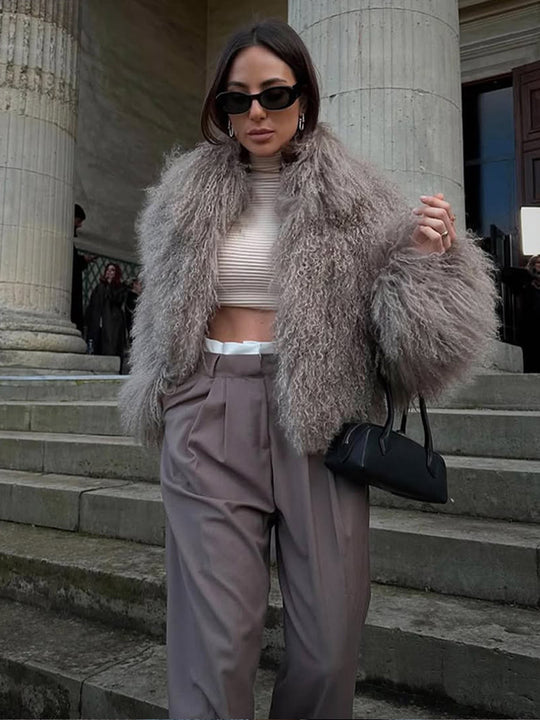 Damen Kunstfelljacke mit voluminösen Ärmeln EB
