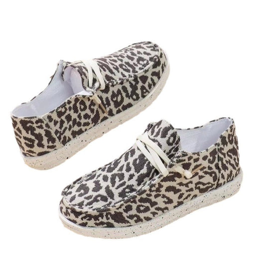 Damen Sneakers im modernen Schwarz-Weiß-Tiermotiv EB