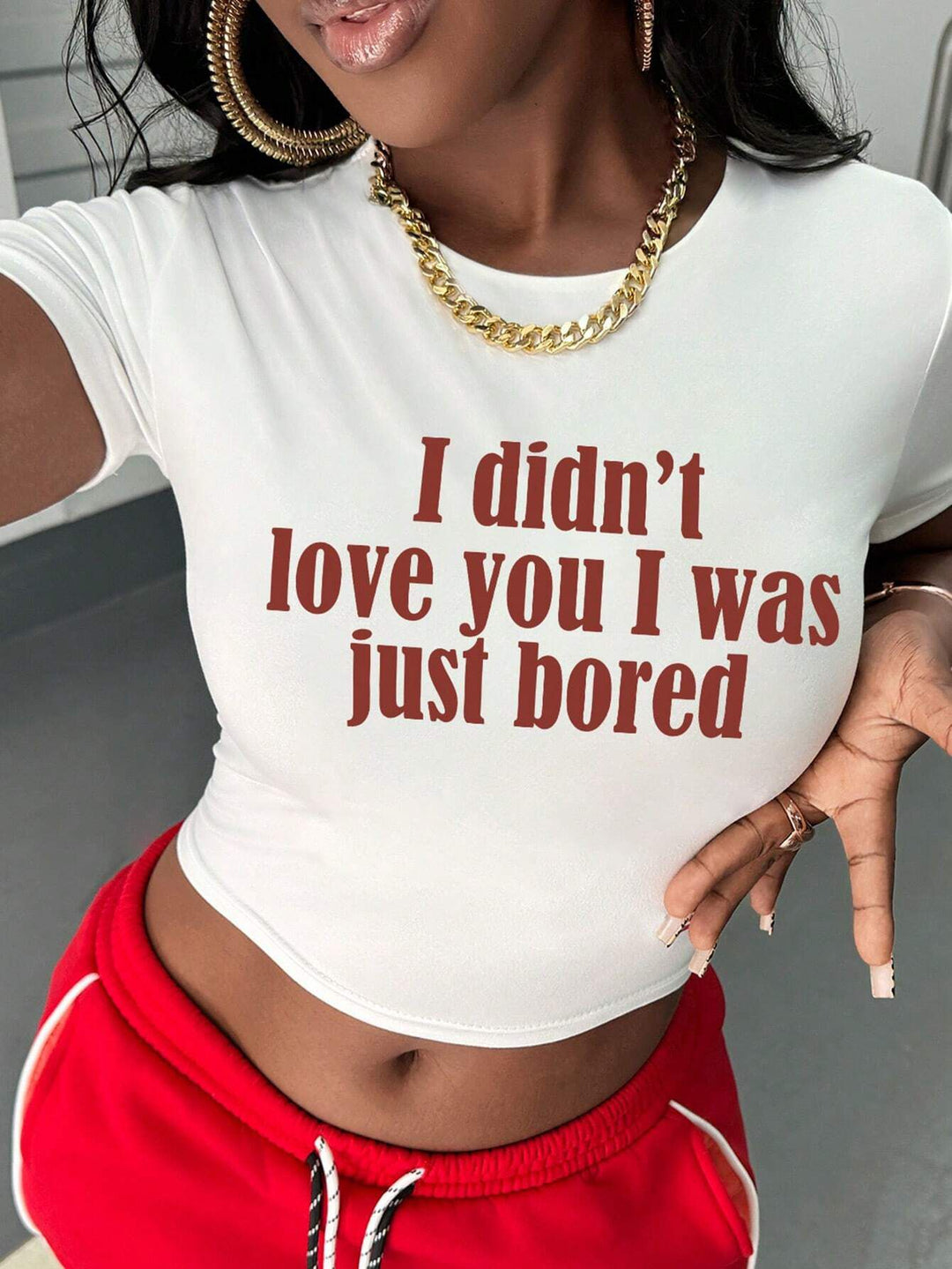 Damen T-Shirt mit kreativem Schlüsselherz-Motiv und modernem Print EB