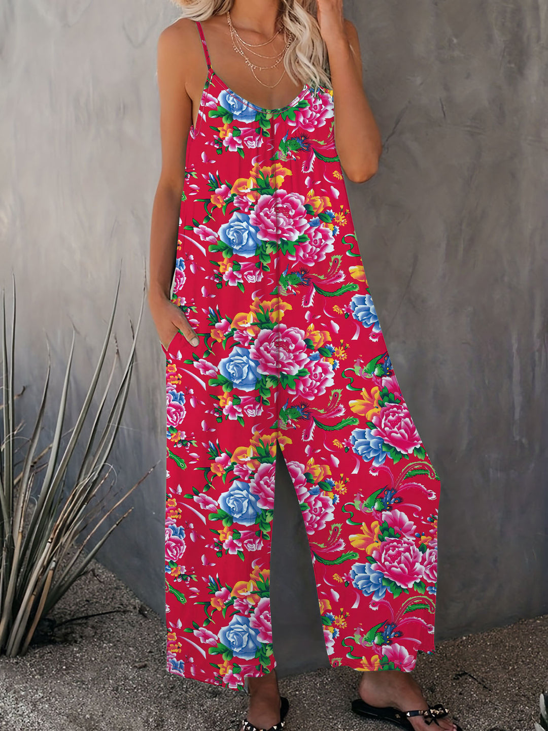 Damen Luftiger Jumpsuit mit floralem Design und verstellbaren Trägern EB