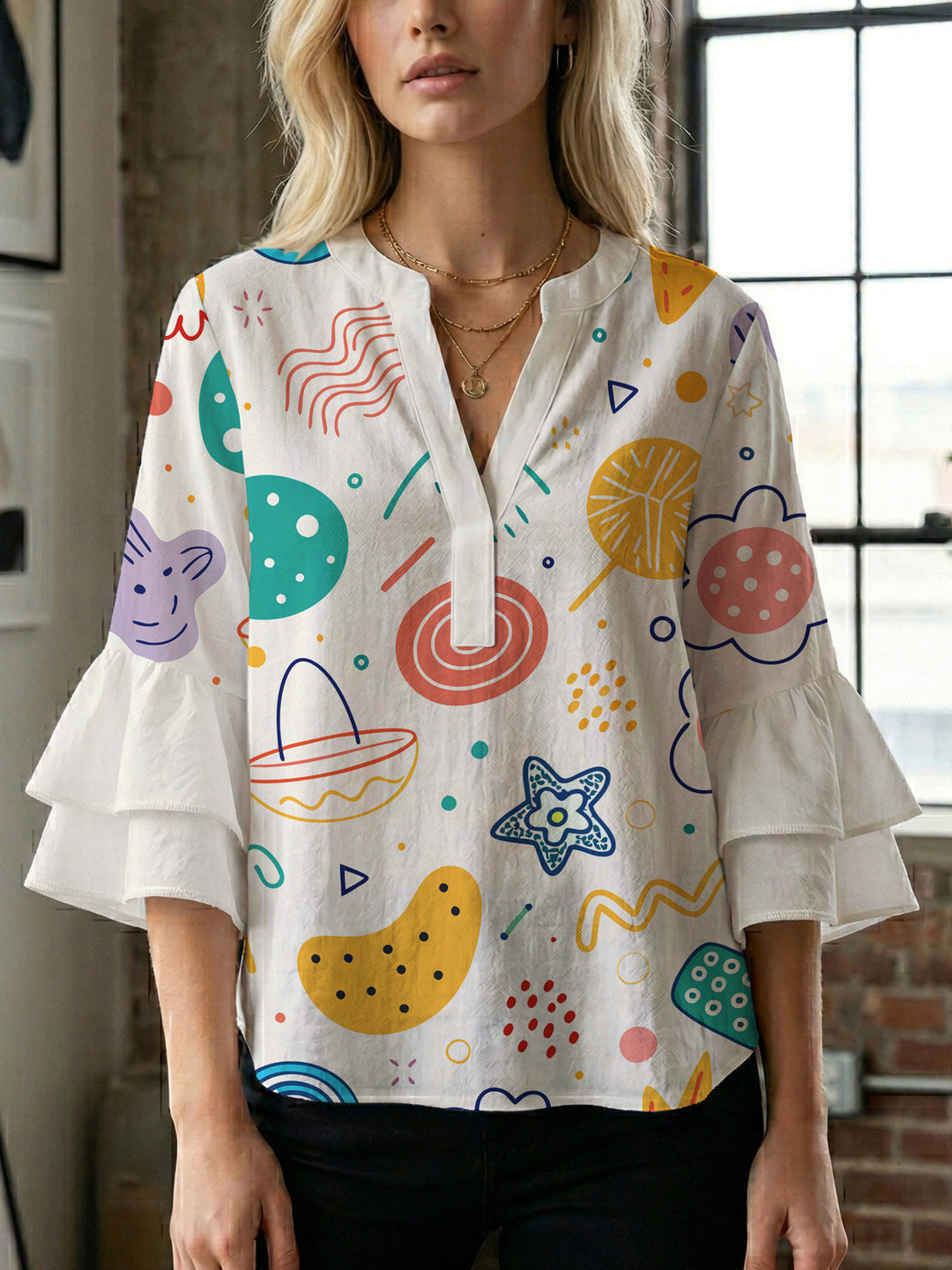 Damen Bluse mit voluminösen Rüschenärmeln und floralem Muster EB
