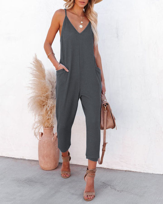 Damen lässiger Jumpsuit mit tiefem V-Ausschnitt und praktischen Seitentaschen EB