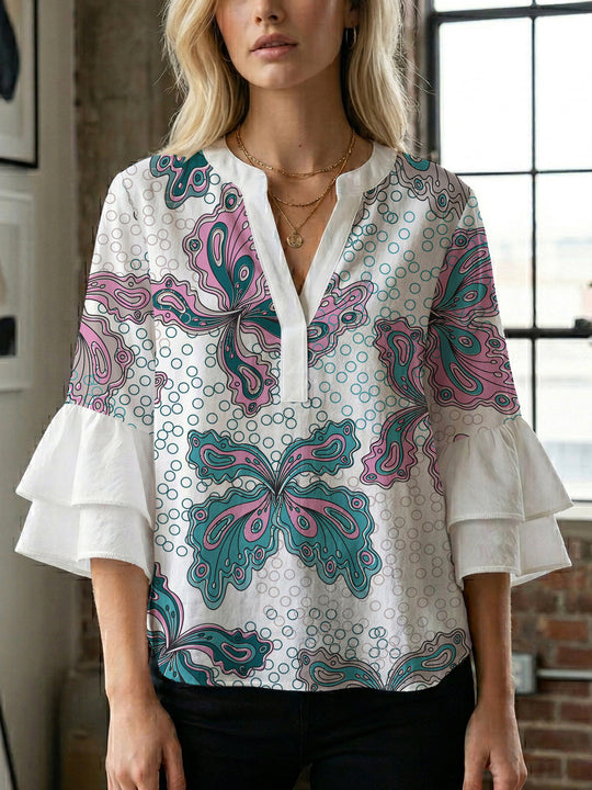 Damen Bluse mit voluminösen Rüschenärmeln und kreativem Floraldesign EB