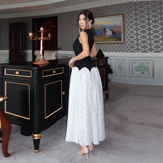 Damen elegantes Maxikleid mit gepunktetem Rockteil und tailliertem Oberteil EB
