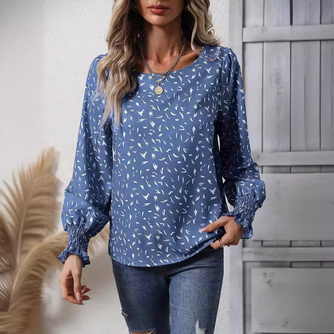 Damen elegante Bluse mit raffinierten Puffärmeln und zartem Muster EB