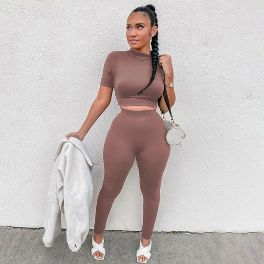 Damen Sportliches Set aus kurzlich-ärmeligem Crop-Top und enganliegenden Leggings EB