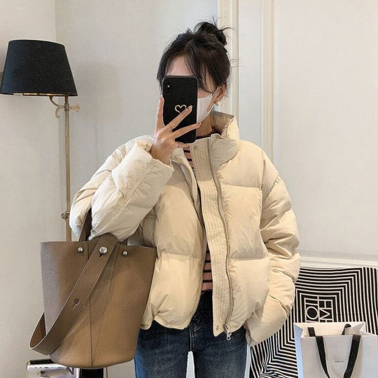 Damen Oversized Pufferjacke mit elastischem Bund und seitlichen Reißverschlusstaschen EB