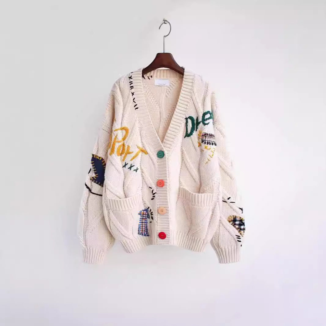 Damen Strickjacke mit buntem Motiv und praktischen Taschen EB