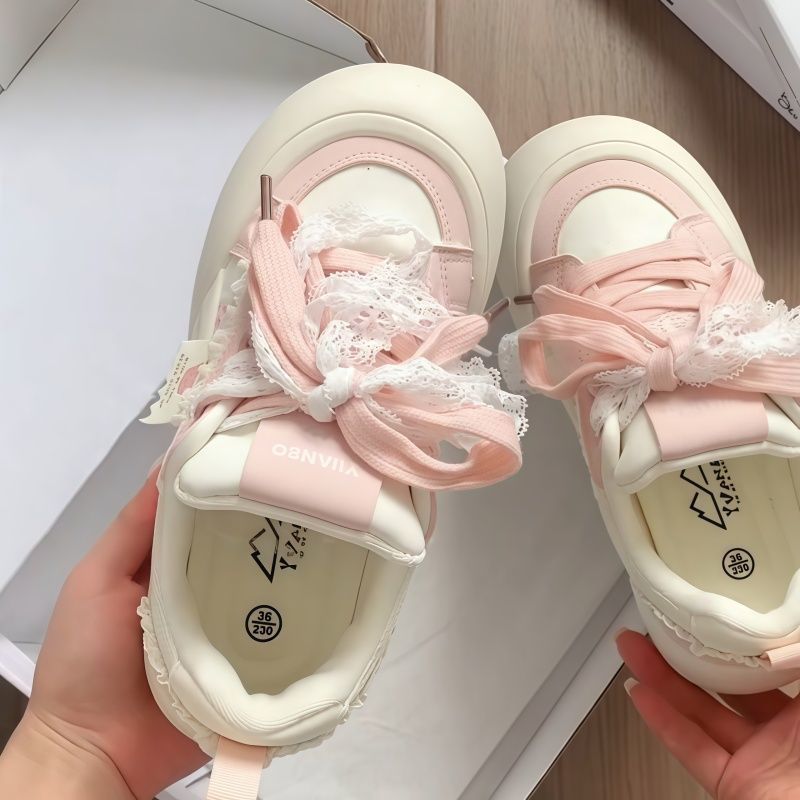 Damen Sneakers mit dekorativen Rüschen und verspielten Schleifen EB