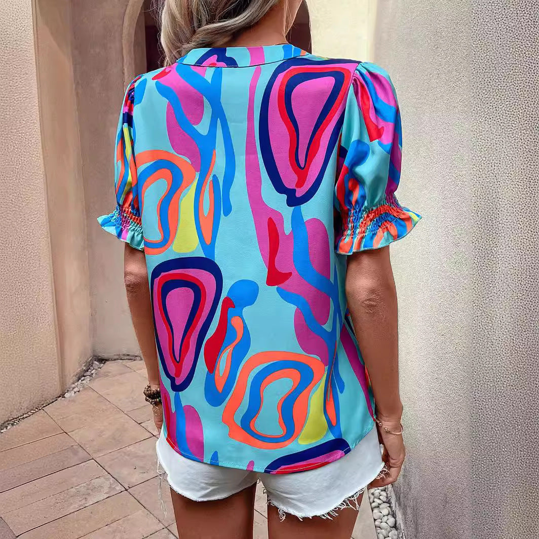 Damen Bluse mit kessen Puffärmeln und kreativem Grafikdesign EB