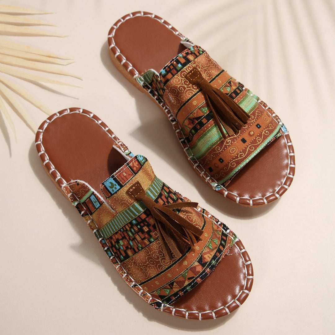 Damen Lifestyle Pantoletten mit verspieltem Tassel-Design und buntem Webmuster EB