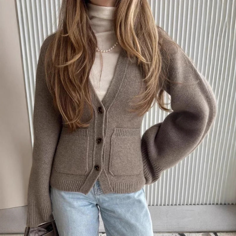 Damen Strickjacke mit voluminösen Ärmeln und praktischen Taschen EB