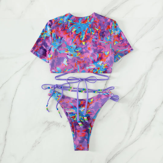 Damen Crop-Top Bikini-Set mit kreativem Schnitt und farbenfrohen Akzenten EB