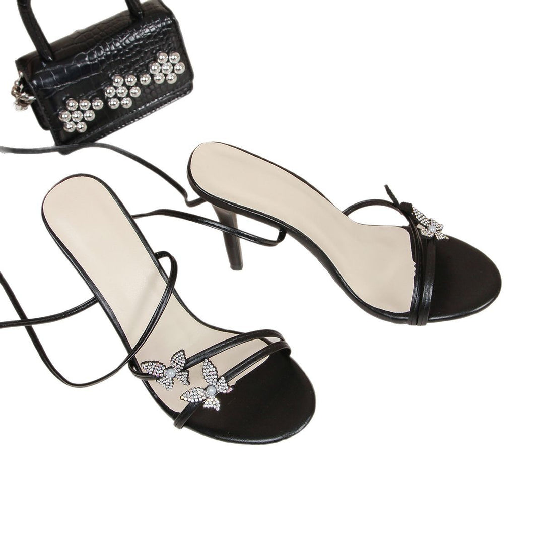 Damen Hochhackige Sandalen mit funkelndem Schmetterlingsapplikation EB