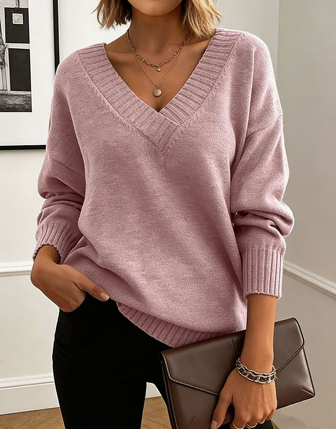 Damen Feinstrickpullover mit tiefem V-Ausschnitt und überschnittener Schulter EB
