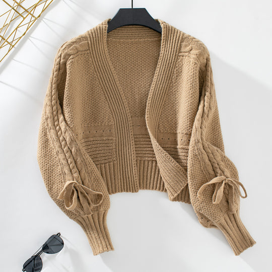 Damen modische Strickjacke mit voluminösen Ärmeln und Zopfmuster EB