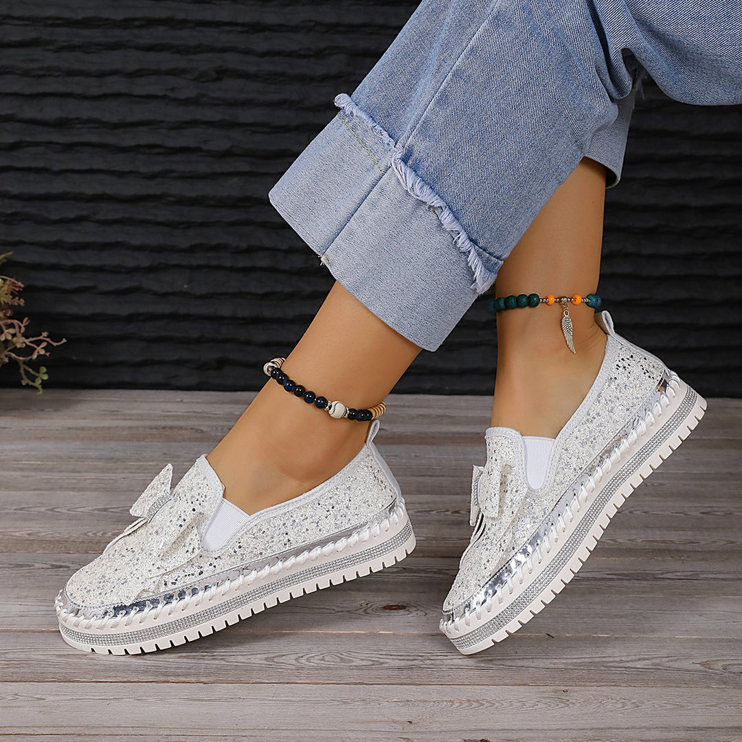 Damen modische Slip-On Sneakers mit glitzerndem Design und auffälliger Schleifenapplikation EB