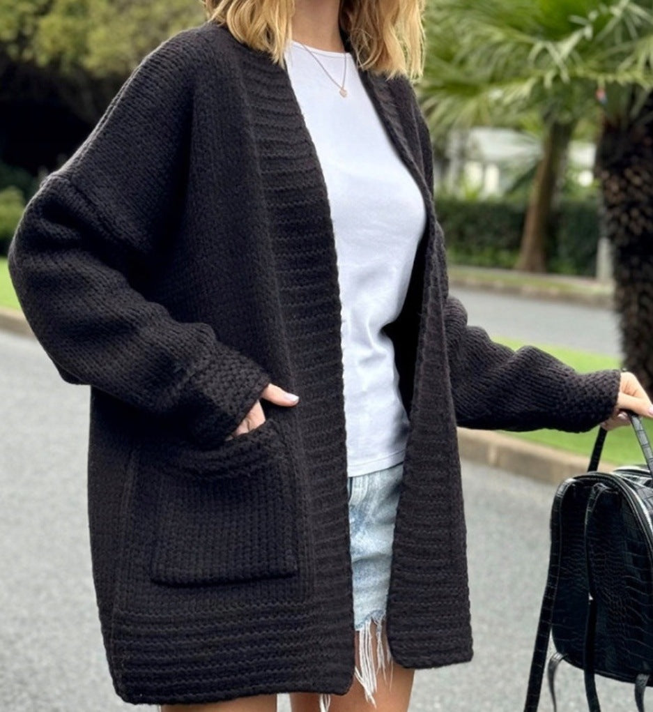 Damen Grobstrickjacke mit großzügigen Taschen und lässigem Schnitt EB