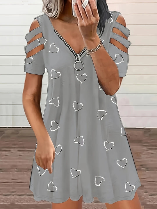 Damen Freizeitkleid mit Cut-Out-Ärmeln und Herzmuster EB