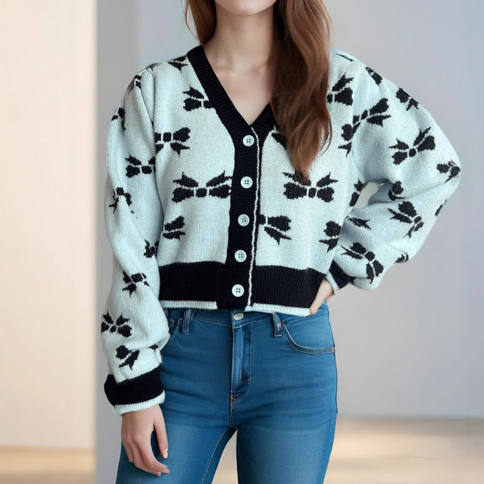 Damen Strickjacke mit verspieltem Schmetterlingsmotiv und dekorativen Knöpfen EB