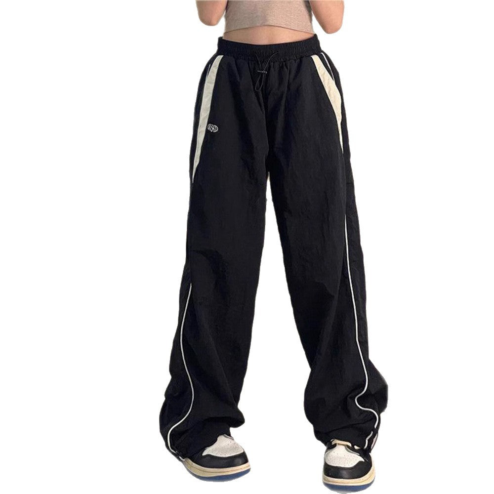 Damen nan weite Trackhose mit Kontrastpaspel, elastischem Bund und Oversize-Schnitt EB