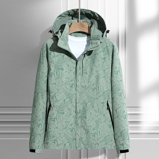Damen leichte Packbare Regen- und Windjacke mit Kapuze, Blattmuster und verdeckten Reißverschlüssen EB