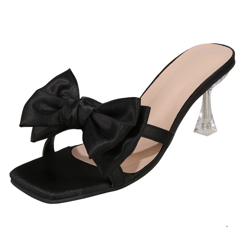 Damen Satin-Mules mit großer Zierschleife und transparentem Stiletto-Absatz EB