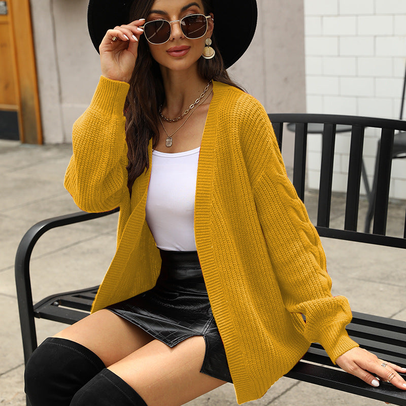 Damen Grobstrickjacke mit voluminösen Ärmeln und modernem Schnitt EB