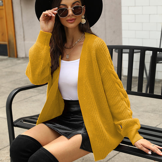 Damen Grobstrickjacke mit voluminösen Ärmeln und modernem Schnitt EB