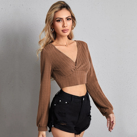 Damen gestricktes Cropped-Wickeltop mit V-Ausschnitt, taillierter Unterbrustnaht und Zopfmuster-Optik Eichborn Berlin
