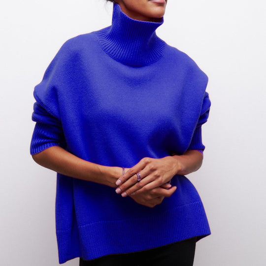 Damen Kuscheliger Oversize Rollkragenpullover mit verdeckten Seitenschlitzen und extra langem Rippbund EB