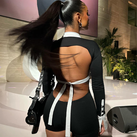 Damen Eleganter Jumpsuit mit tiefem Ausschnitt und kontrastierenden Ärmeln EB
