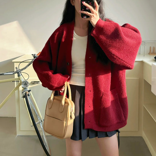 Damen Gemütliche Strickjacke mit großen Taschen und Knopfdetail EB