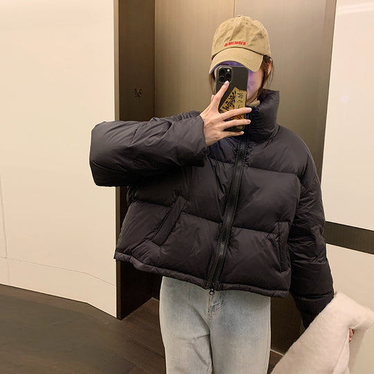 Damen Kurz geschnittene Pufferjacke mit hohem Kragen und seitlichen Taschen EB