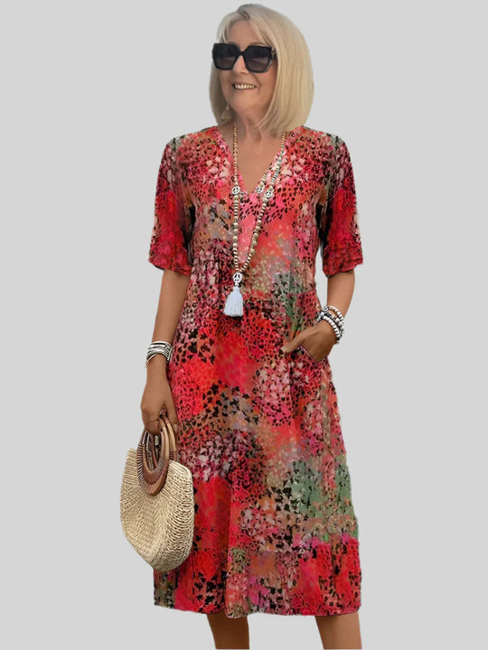 Damen Sommerliches Maxikleid mit floralem Design und praktischen Taschen EB
