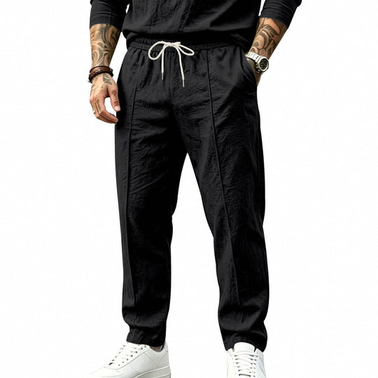 Herren nan tapered Freizeit-Chinohose mit elastischem Tunnelzugbund, dekorativer Bügelfalte und seitlichen Eingrifftaschen EB