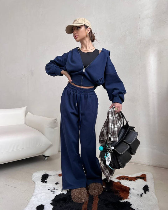 Damen kurzes Kapuzen-Sweatjacke mit Balloonärmeln und elastischer High-Waist Palazzo-Freizeithose Eichborn Berlin