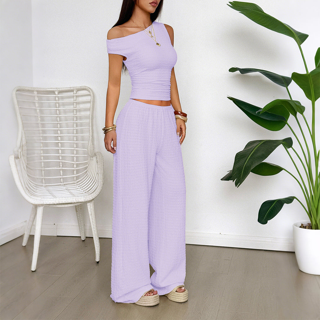 Damen Zweiteiliges Set aus elastischem Rippstoff mit asymmetrischem Top und weitem Hosen EB
