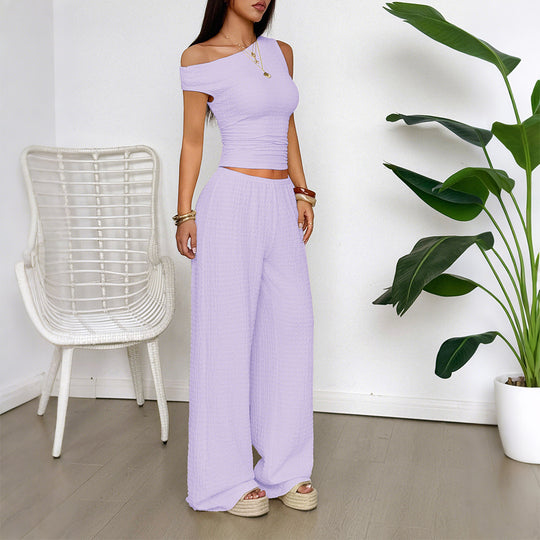 Damen Zweiteiliges Set aus elastischem Rippstoff mit asymmetrischem Top und weitem Hosen EB