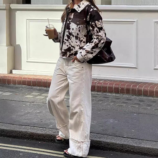 Damen Steppjacke im Cowprint Design mit klassischem Schnitt EB