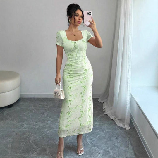 Damen Midi-Kleid mit raffinierten Falten und floralem Muster EB