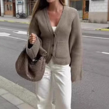 Damen Strickjacke mit voluminösen Ärmeln und praktischen Taschen EB