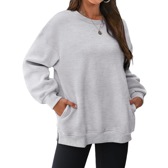 Damen nan verlängertes Oversize Rundhalspullover mit seitlichen Eingrifftaschen, Rippbündchen und überschnittener Schulter EB