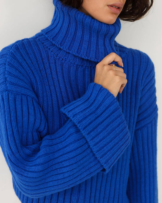 Damen Chunky Strickpullover mit hohem Kragen und Rippstruktur EB