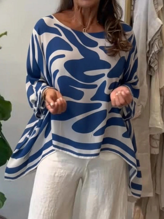 Damen Oversize Sommerbluse mit abstraktem Print, Fledermausärmeln und asymmetrischem Saum EB